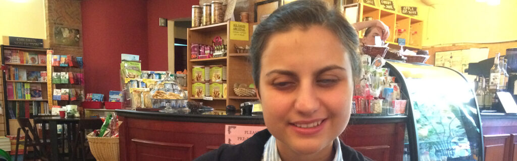 Gumberidze sits at a table in a coffee shop in Tbilisi, Georgia.