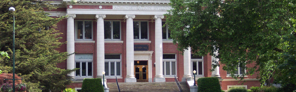A brick academic building at the University of Oregon. Photo credit: "JohnsonHallUO". Licensed under Public domain via Wikimedia. Commons