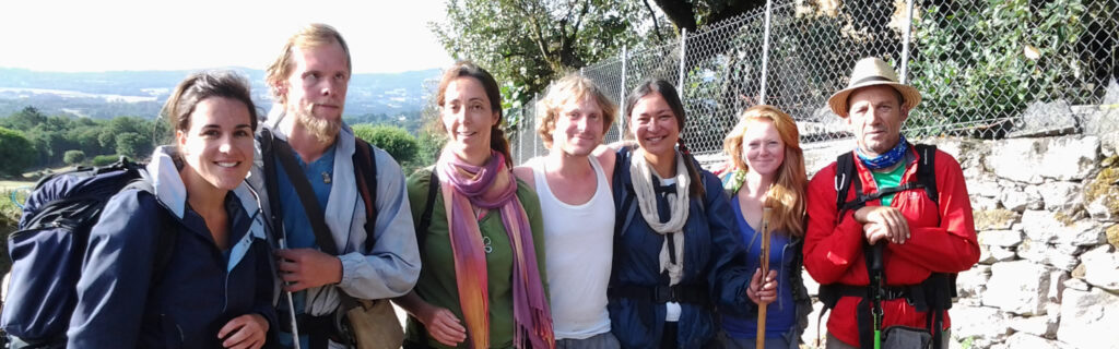 Nick posing with 6 fellow-hikers in Spain.