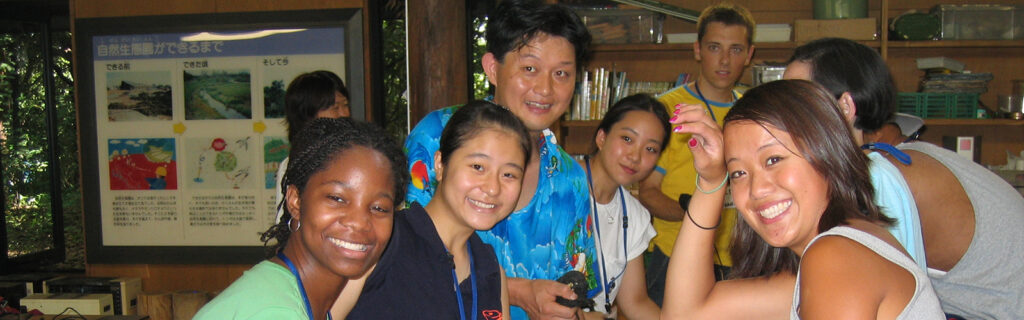 Group of diverse American exchange students smile at the camera