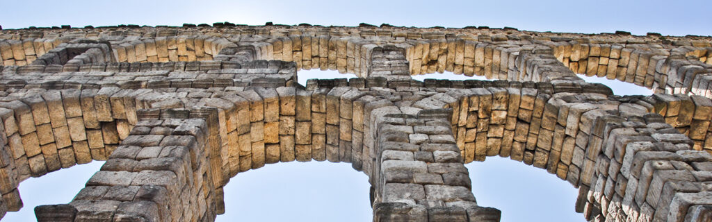 Stone arches of bridge or acquaduct in Italy