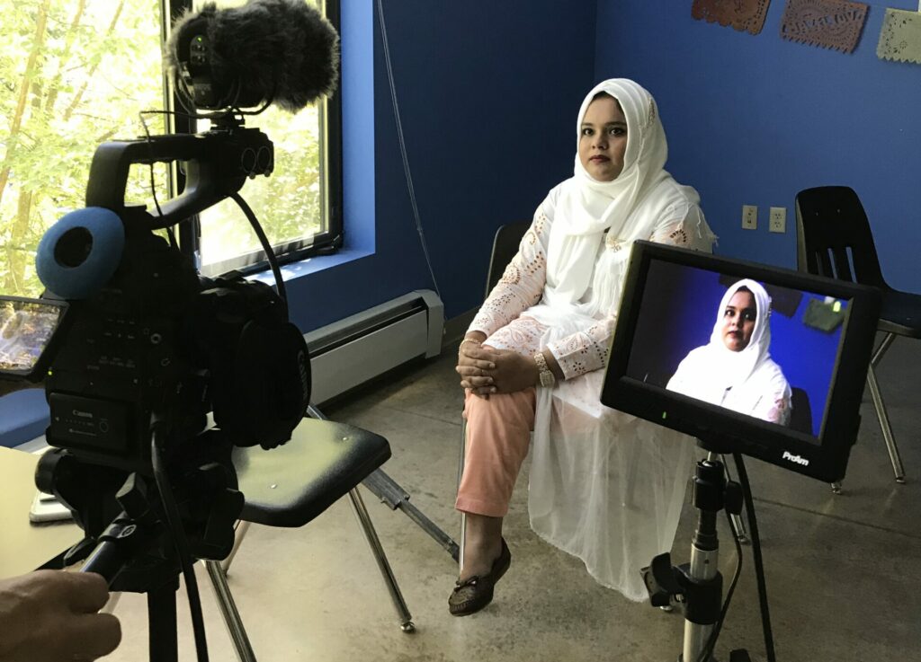 Sharmin practices a TV interview