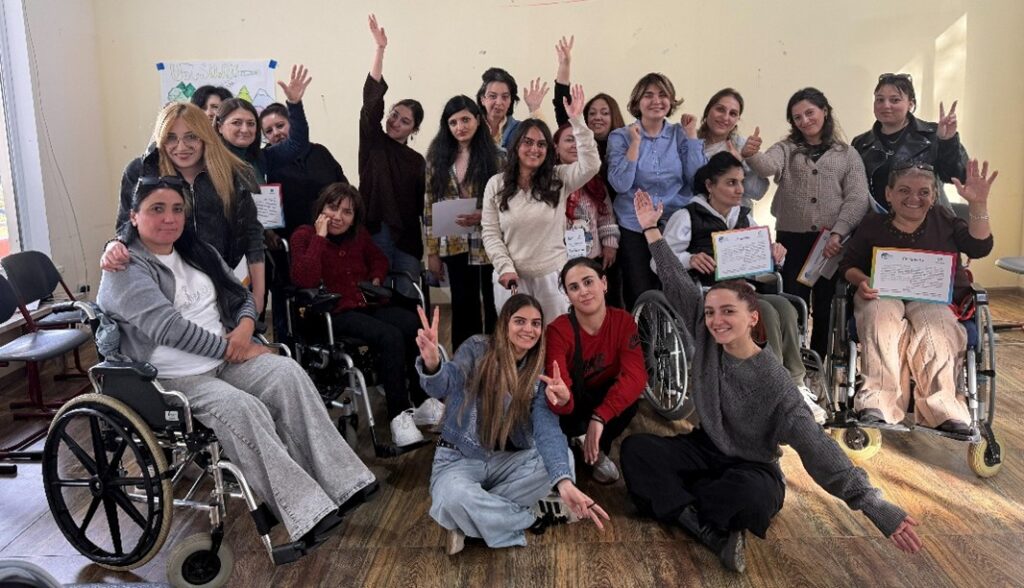 WILD-Armenia participants proudly display their graduation certificates.