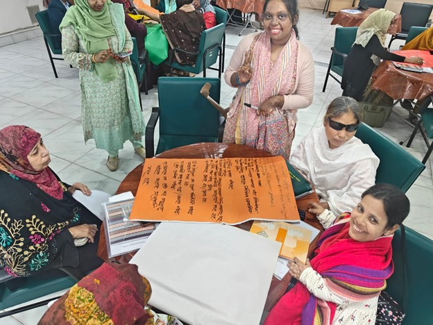 WILD-Bangladesh participants work together on a small group activity.