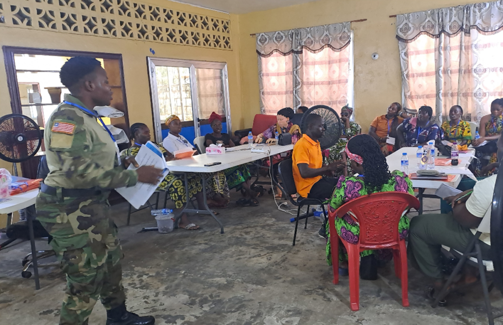 A facilitator talks about violence prevention at WILD-Liberia.