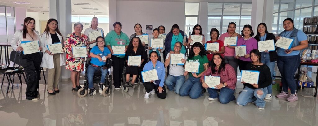 WILD-Mexico group proudly displays their WILD certificates.